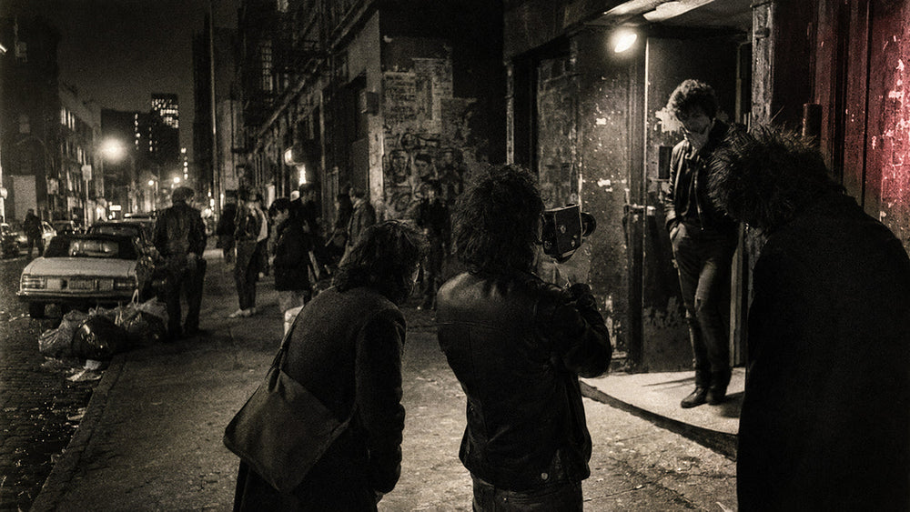 Young underground filmmakers shooting a Super 8 movie on a grimy late-1970s East Village street in New York