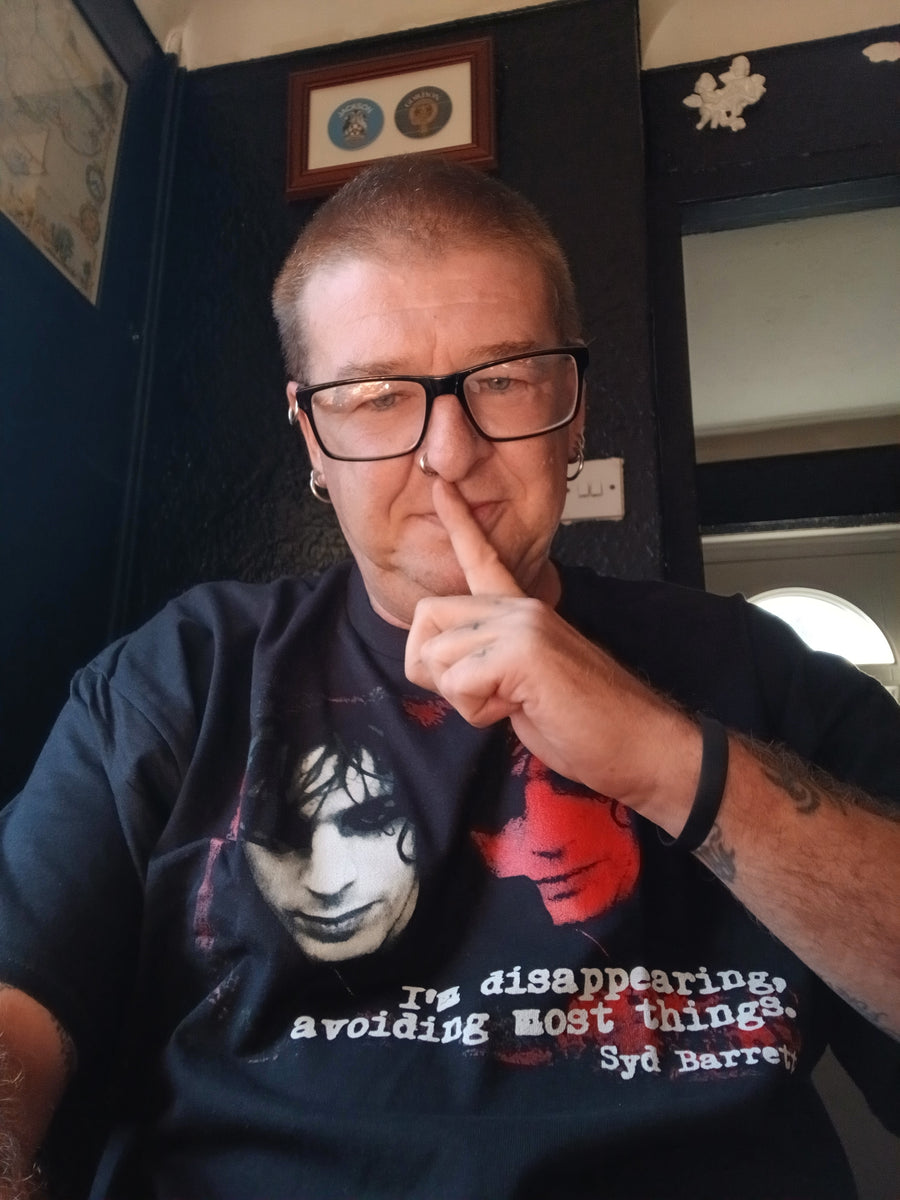 Hellwood Outfitters customer wearing a graphic T-shirt