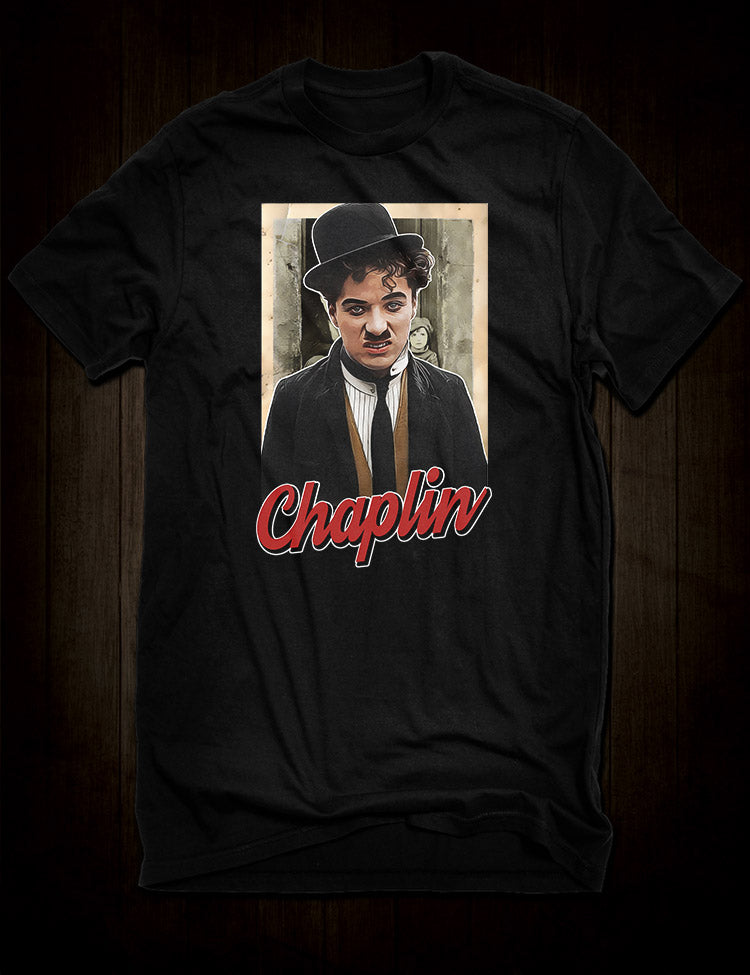 Black t-shirt featuring a graphic of Charlie Chaplin's iconic character, The Tramp, with his signature bowler hat and mustache.